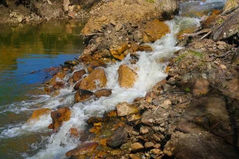 Stream with current water Stock Photos
