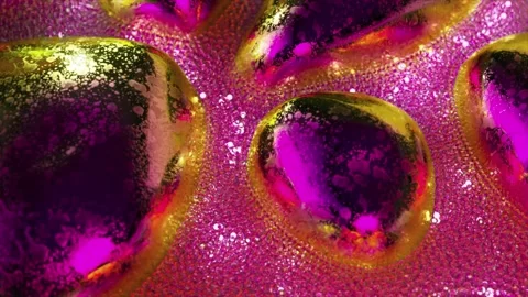 Stream of diamond glowing bubbles. Colored metal objects. Pink gold neon color Video stock 244343375