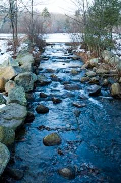Stream draining leach pond Stock Photos