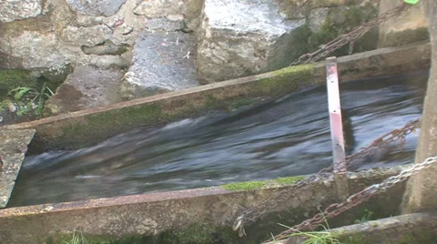 Stream enters the old water mill Stock Footage 35955984
