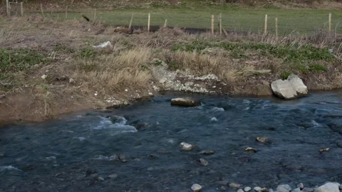 Stream by a Field Stock-Footage 85426540