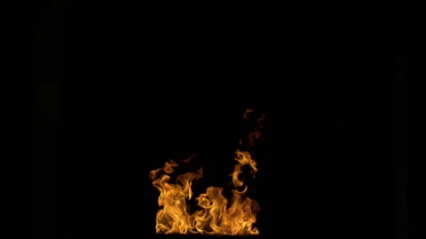 Stream of fire, black background | Stock Video | Pond5