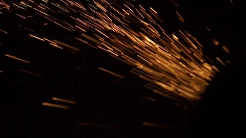 Stream of fire sparks on a black background Stock Footage 87571092