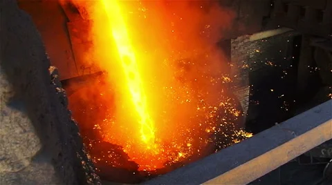 Stream of fire in a vat and flying sparks Stock Footage 54950961