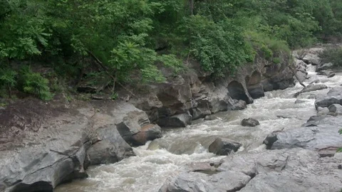 Stream flow in the rocky channel Stock Footage 93412762