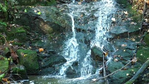 Stream flowing down over rocks. Video stock 125715828