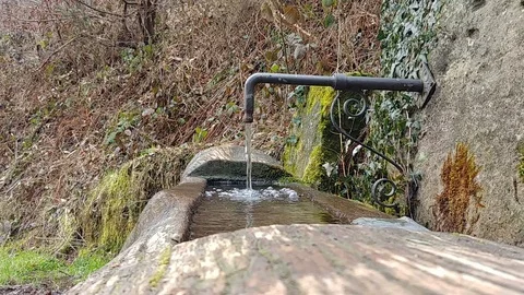 Stream flowing in a Drinking Trough Stock Footage 90252168
