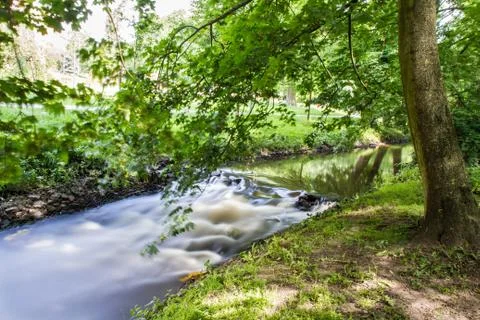 Stream flowing - long exposure Stock Photos