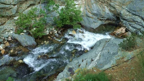 Stream flowing from mountains 動画素材 111791879