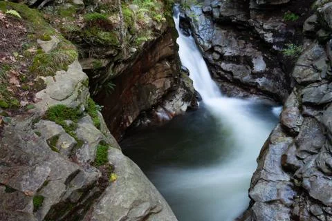 Stream flowing into pool Stock Photos