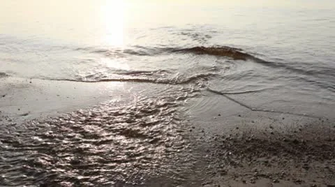 Stream flowing into sea Stock Footage 10572401