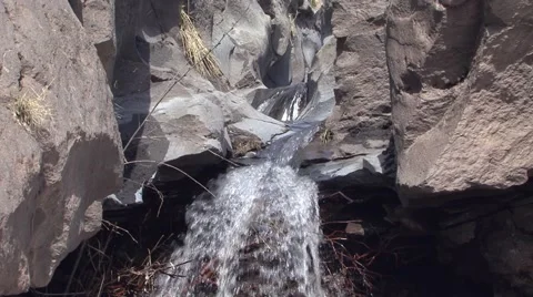 Stream flowing smoothing the rock Stock Footage 52075952