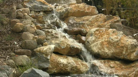 Stream flowing through the rocks Video stock 545420
