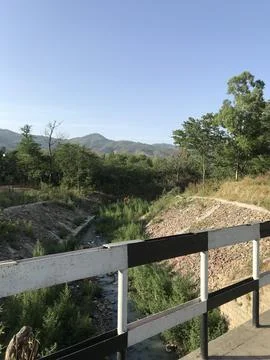 Stream flowing in a valley Foto stock