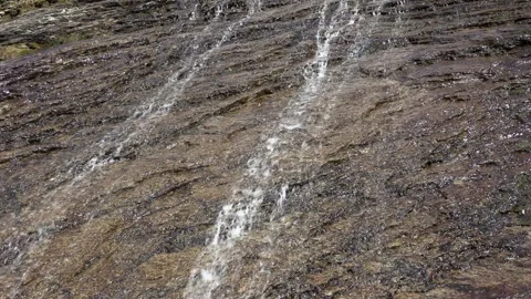 A stream flows down the mountain Stock Footage 278688590