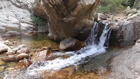 Stream flows on rocks 60fps, could edit head and tail Video stock 88971176