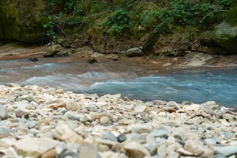 The stream flows from a source of hydrogen sulfide. Stock Photos
