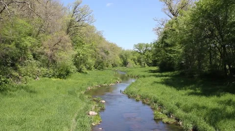 Stream flows in sunlight Stock Footage 6711589