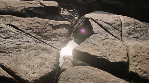 Stream flows through rocks, serene nature scene with sun glares. Perfect Stock Footage 258800885