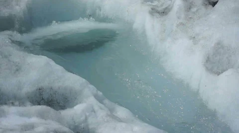 Stream flows through snow and ice. Franz Josef Glacier, New Zealand 스톡 동영상 52951858