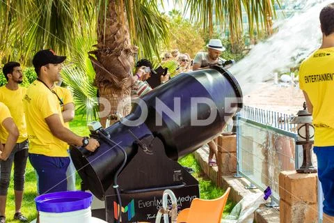 A stream of foam escapes from the foam generator. A foamy party on the beach Stock Photos