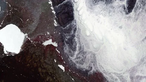 Stream of gray, brown, purple and glitter silver liquid metallic ink. Texture of Stock Footage 218642935