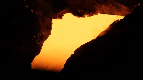 A stream of liquid metal flows down Stock Footage 139736137