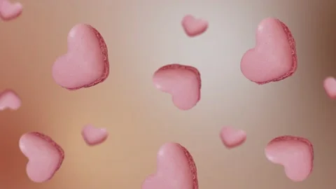 A stream of many different diameters French macaroon cookies. 4k - Valentine's Stock Footage 168619152