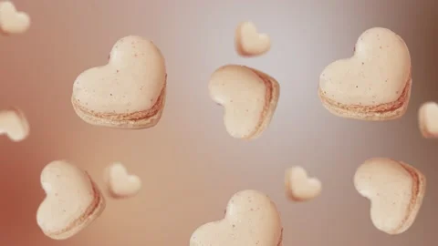 A stream of many different diameters French macaroon cookies. 4k - Valentine's Stock Footage 168619232