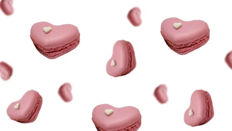 A stream of many different diameters French macaroon cookies. 4k - Valentine's Stock Footage 168620852