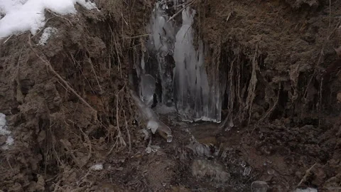 A stream of melt water like a ice waterfall Stock Footage 232596142