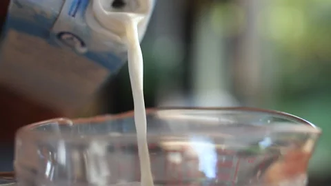 Stream of Milk Pouring, HD Stock Footage 148191585