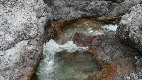 Stream in the mountains with rocks and clear water Video stock 211453167