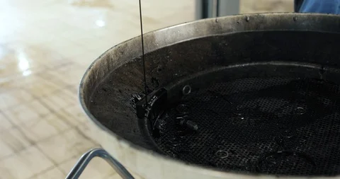 Stream Of The Old Used Engine Oil From A Car Stock-Footage 124958844