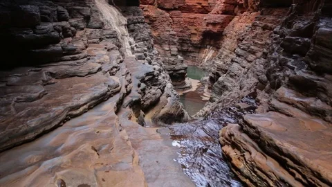 Stream out of Kermits Pool in Hancock Gorge Stock Footage 71109007