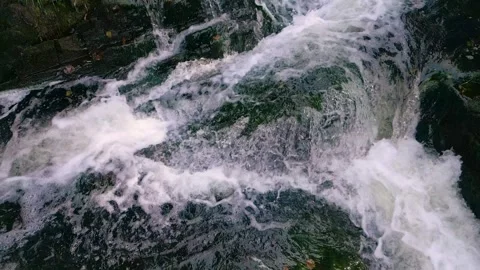 Stream Over Rocks Covered With Moss In A Rocky River. Close up Video stock 249727801
