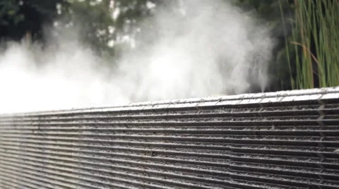 Stream over waterfall on stone wall Stock Footage 60140376