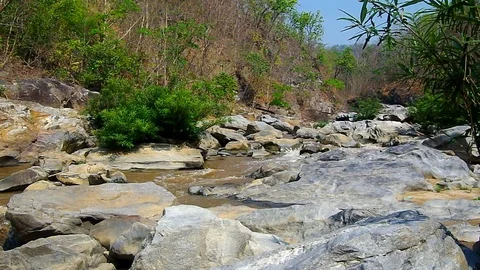 Stream pass through the rocky channel Stock Footage 88873110