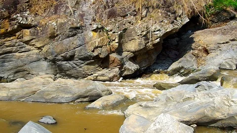 Stream pass through the rocky stream channel Stock Footage 88873004