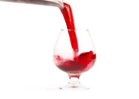 A stream of red wine Stock Photos