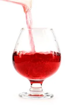 A stream of red wine Stock Photos