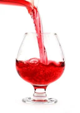 A stream of red wine Stock Photos