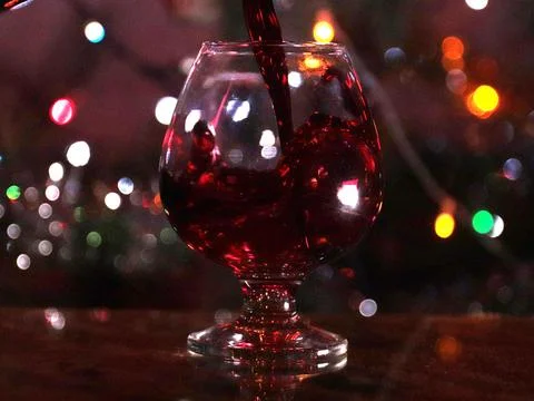 A stream of red wine 스톡 사진