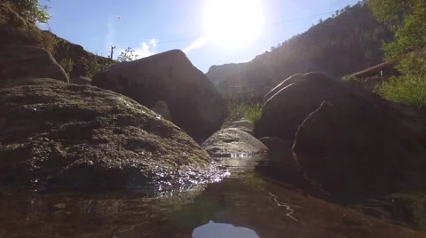 Stream river with clear water steady shot gimbal 4k Stock Footage 67993848