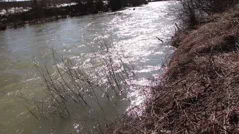 The stream of the river. Early spring daytime Stock Footage 149984537