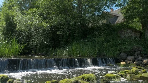 Stream on a ruined old mill dam Stock-Footage 102310840