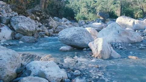 Stream running river. Small waterfall with crystal clear water. Stock Footage 167708637