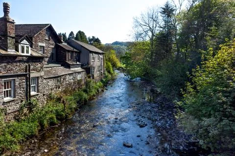 Stream running through Grasmere in the lakes district in Cumbria, UK. Stock Photos
