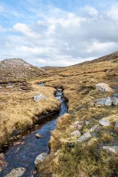 Stream running through peat bog on Isle of Lewis in the Outer Hebrides, Scotland Stock Photos