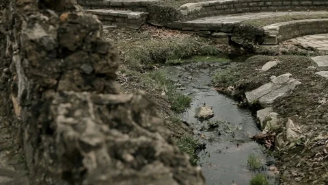 Stream running through a rock garden in the Fall Stock-Footage 91840718
